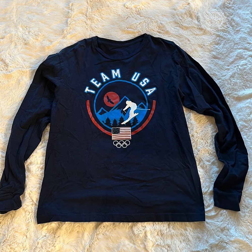 Olympic Team Apparel ski shirt. Youth XL, fits like an adult small. Navy Blue